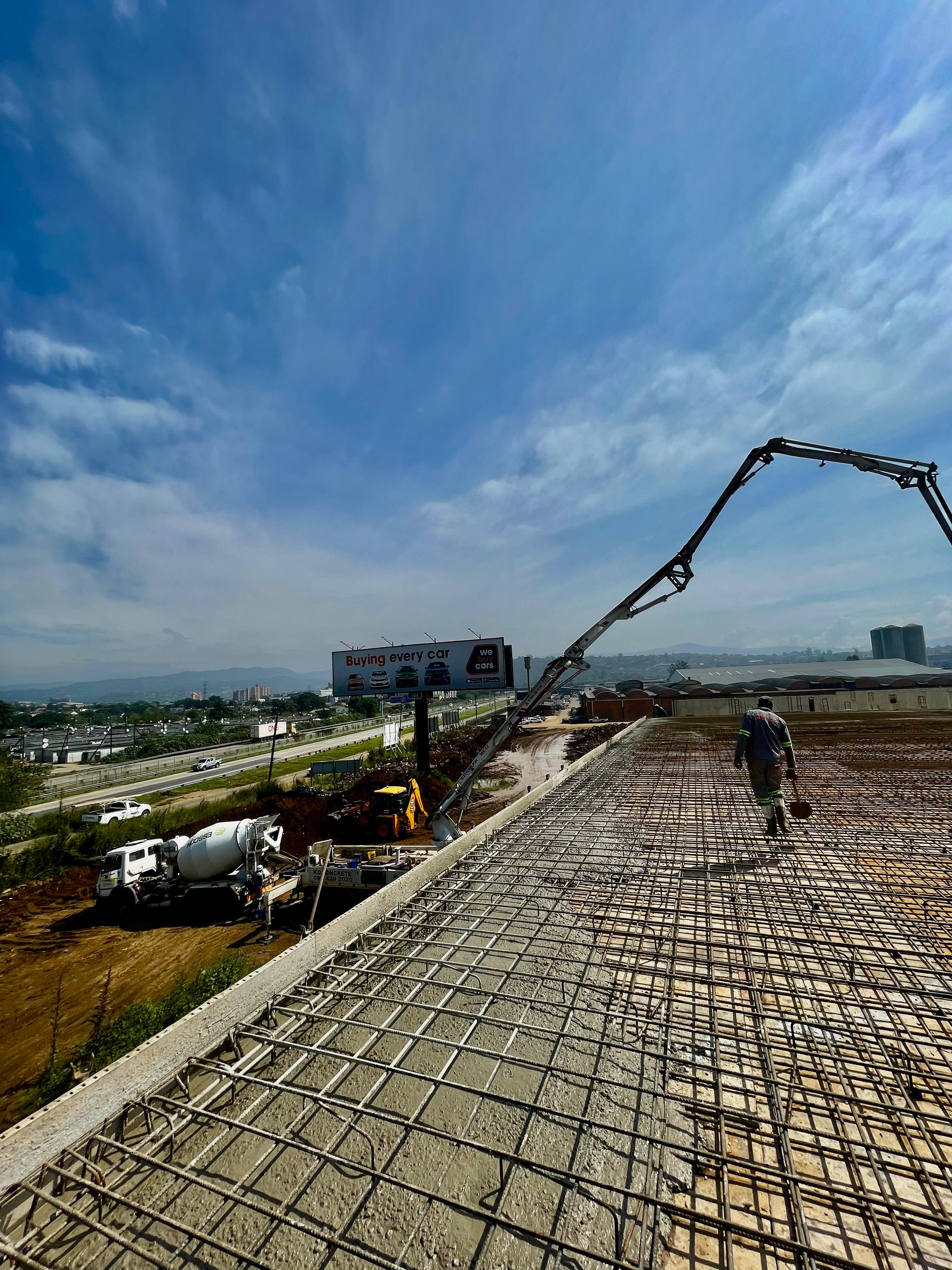 Esscon concrete being pumped onto an elevated slab on a Pietermaritzburg construction site